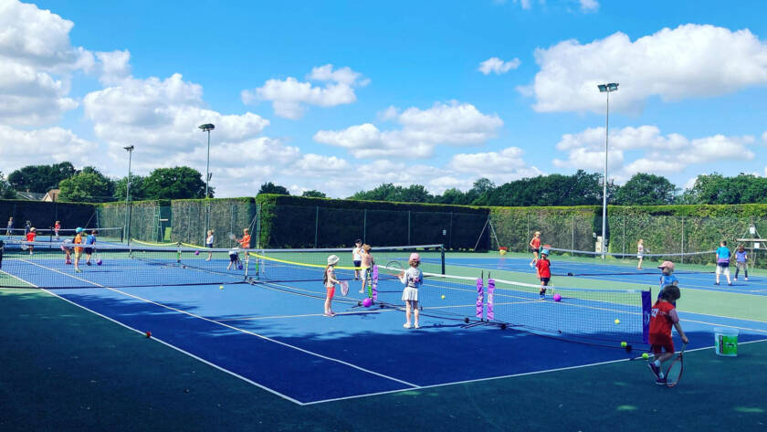 East Bergholt Tennis Club kids tennis coaching on all weather court