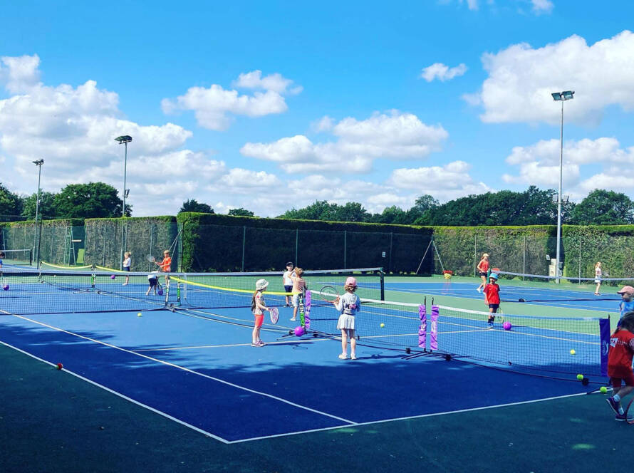 East Bergholt Tennis Club kids tennis coaching on all weather court
