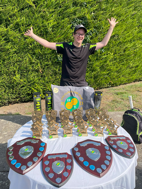 Tennis trophies on table